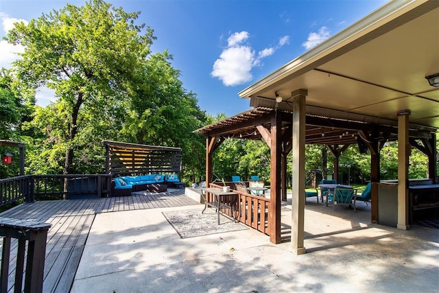10517 SE 49th St, Oklahoma City, OK 73150 - view of patio with outdoor lounge area, a wooden deck, and outdoor dining space