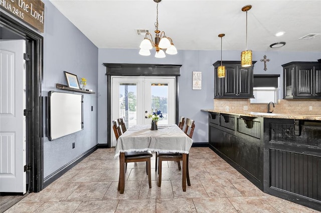 5901 NE Watts Rd, Elgin, OK 73538 - dining area featuring plenty of natural light, a chandelier, and french doors