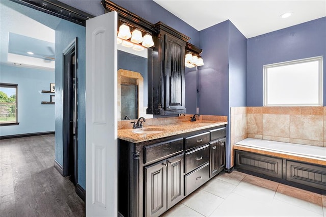 5901 NE Watts Rd, Elgin, OK 73538 - full bathroom featuring a bath, double vanity, and recessed lighting