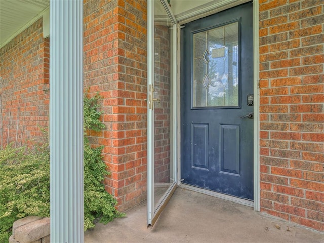 356818 E 1070th Rd, Prague, OK 74864 - doorway to property featuring brick siding