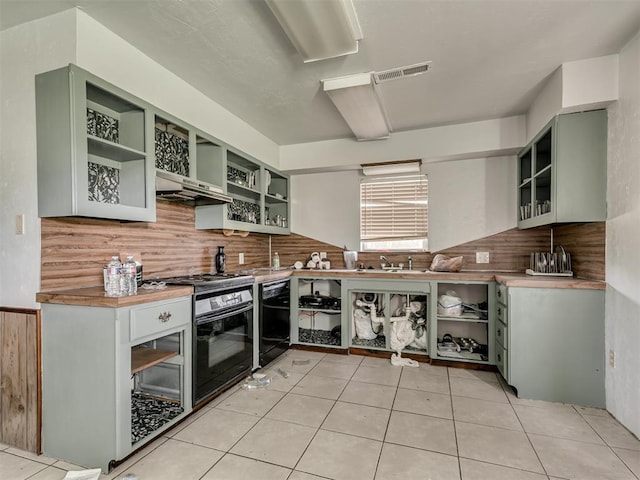 356818 E 1070th Rd, Prague, OK 74864 - kitchen featuring green cabinetry, open shelves, backsplash, and black appliances