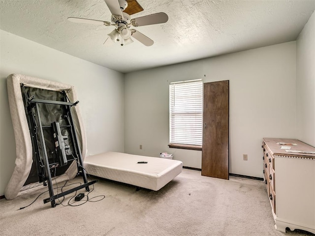 356818 E 1070th Rd, Prague, OK 74864 - bedroom with light carpet and ceiling fan