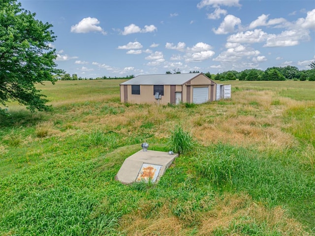 356818 E 1070th Rd, Prague, OK 74864 - view of yard with an outbuilding, a rural view, and a garage