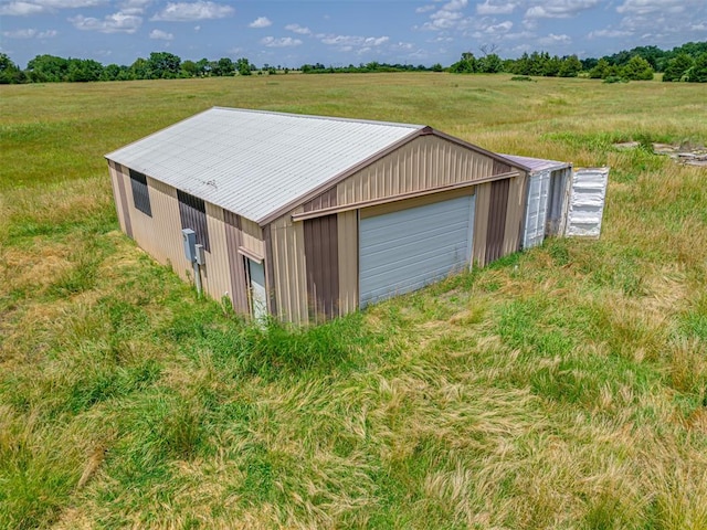 356818 E 1070th Rd, Prague, OK 74864 - detached garage featuring a view of rural / pastoral area