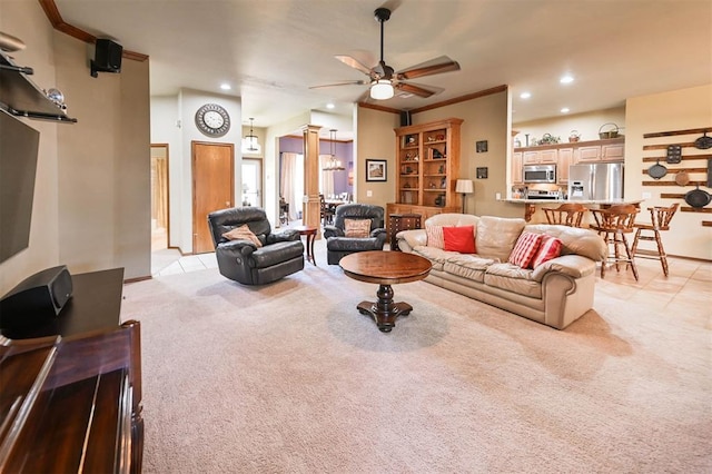 2704 Jills Trl, Edmond, OK 73012 - living room with light colored carpet, ceiling fan, recessed lighting, ornamental molding, and light tile patterned floors