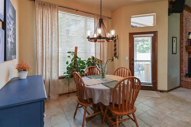 2704 Jills Trl, Edmond, OK 73012 - dining space with a chandelier and light tile patterned flooring