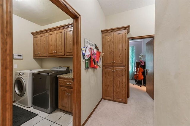 2704 Jills Trl, Edmond, OK 73012 - washroom featuring cabinet space, separate washer and dryer, and light carpet