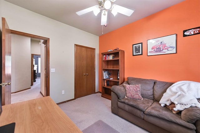 2704 Jills Trl, Edmond, OK 73012 - living room with light colored carpet and a ceiling fan