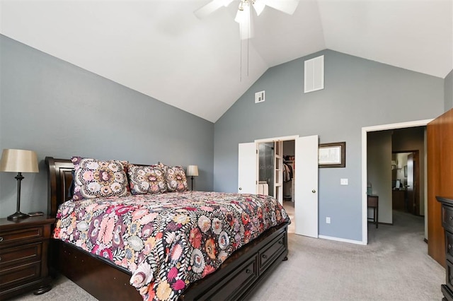 2704 Jills Trl, Edmond, OK 73012 - carpeted bedroom featuring high vaulted ceiling, a spacious closet, a ceiling fan, and a closet