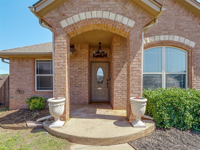 11749 SW 16th St, Yukon, OK 73099 - entrance to property with brick siding and roof with shingles