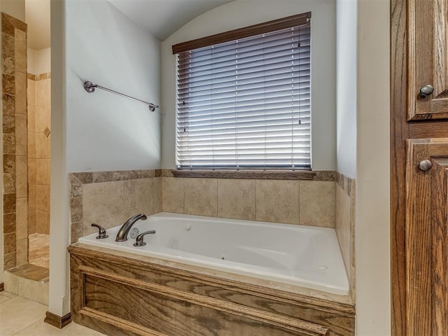 11749 SW 16th St, Yukon, OK 73099 - full bath featuring a whirlpool tub, tiled shower, and lofted ceiling