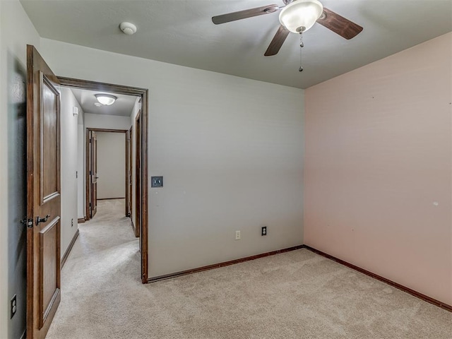 11749 SW 16th St, Yukon, OK 73099 - unfurnished room with light carpet, a smoke detector, and ceiling fan