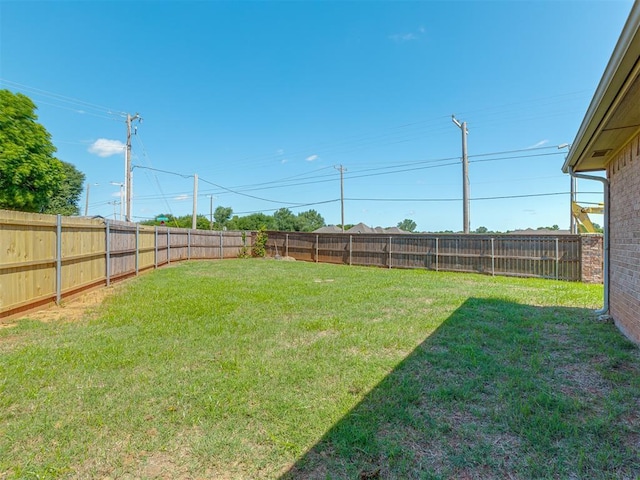 11749 SW 16th St, Yukon, OK 73099 - view of fenced backyard