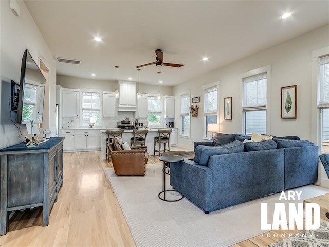 75 Lower Green Way, Carlton Landing, OK 74432 - living room featuring light wood-type flooring, ceiling fan, and recessed lighting