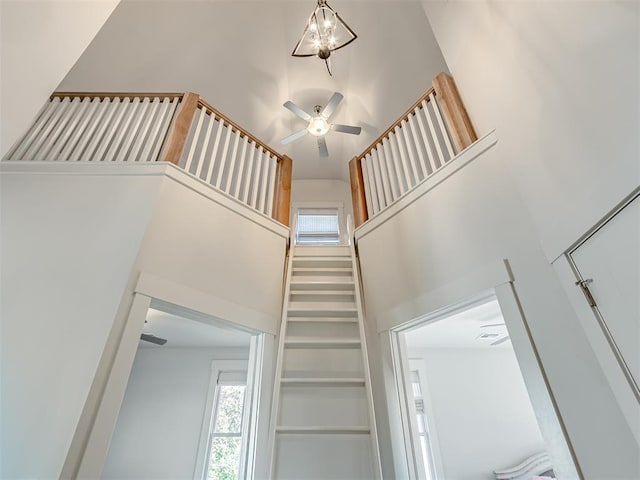 75 Lower Green Way, Carlton Landing, OK 74432 - stairway with a high ceiling, plenty of natural light, and a ceiling fan