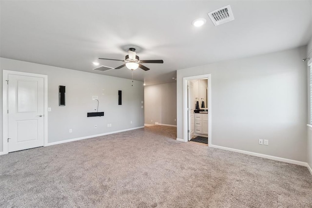 12904 SW 8th St, Yukon, OK 73099 - carpeted empty room with a ceiling fan and recessed lighting