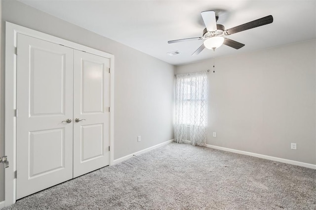 12904 SW 8th St, Yukon, OK 73099 - unfurnished bedroom featuring carpet, a closet, and ceiling fan