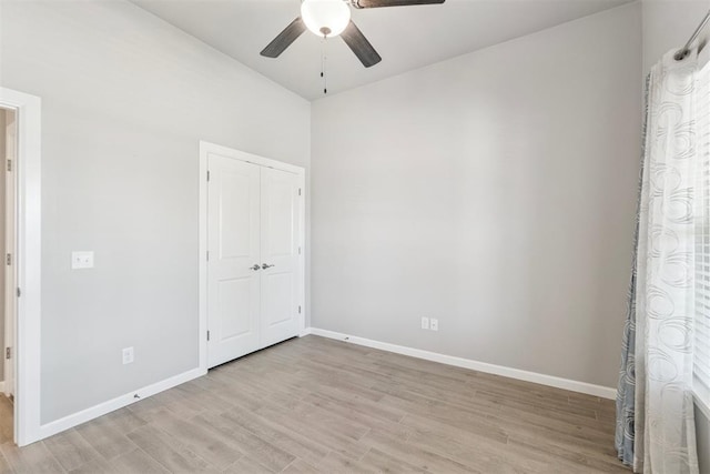12904 SW 8th St, Yukon, OK 73099 - unfurnished bedroom with light wood-style floors, a closet, and ceiling fan