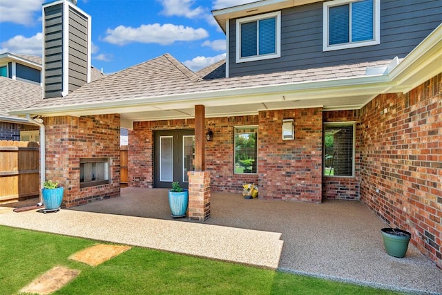 12904 SW 8th St, Yukon, OK 73099 - view of patio / terrace featuring a fireplace