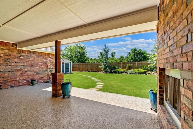 12904 SW 8th St, Yukon, OK 73099 - fenced backyard featuring a shed and a patio