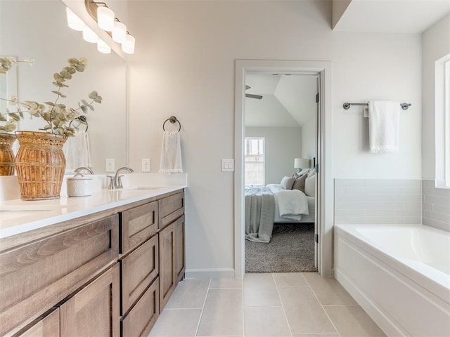 11700 SW 15th Ter, Yukon, OK 73099 - bathroom with double vanity, a bath, tile patterned flooring, and ensuite bathroom