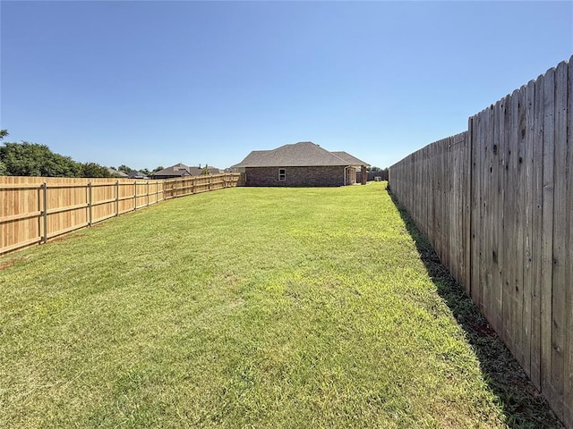 11728 SW 14th St, Yukon, OK 73099 - view of fenced backyard