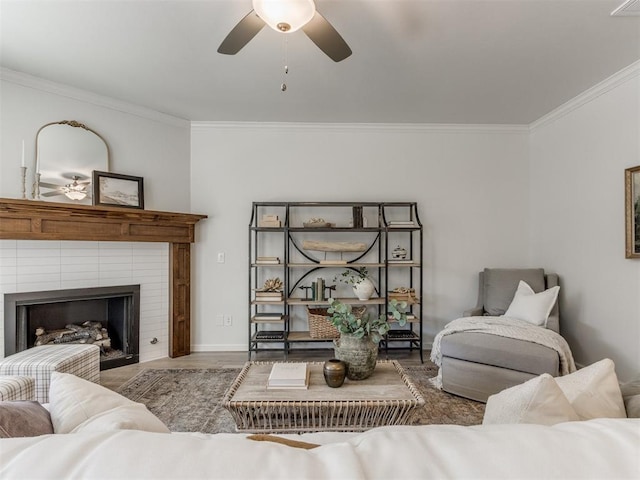 11728 SW 14th St, Yukon, OK 73099 - living room with ceiling fan, crown molding, a fireplace, and wood finished floors