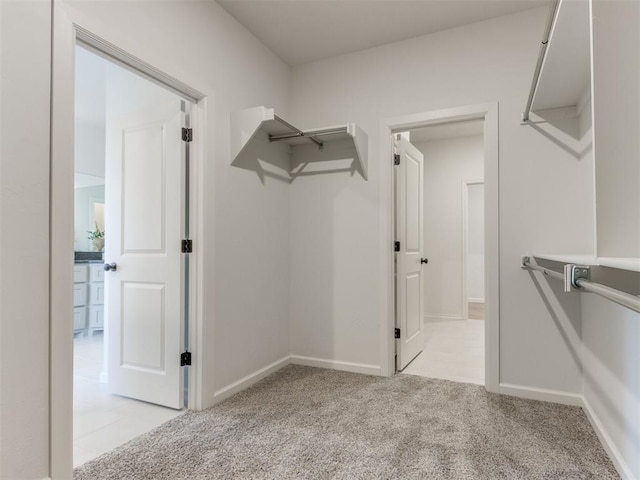 11728 SW 14th St, Yukon, OK 73099 - spacious closet featuring light carpet