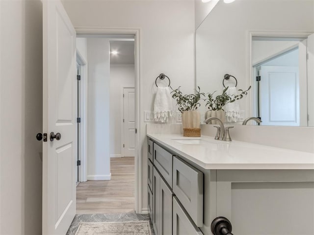 11728 SW 14th St, Yukon, OK 73099 - bathroom featuring vanity and wood finished floors