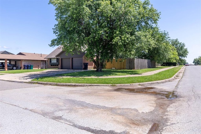 4800 SE 45th St, Oklahoma City, OK 73135 - view of front of house with asphalt driveway