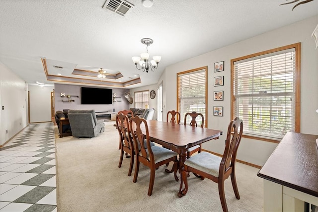 910796 S 3350th Rd, Wellston, OK 74881 - dining space with plenty of natural light, light carpet, a chandelier, a ceiling fan, and a textured ceiling