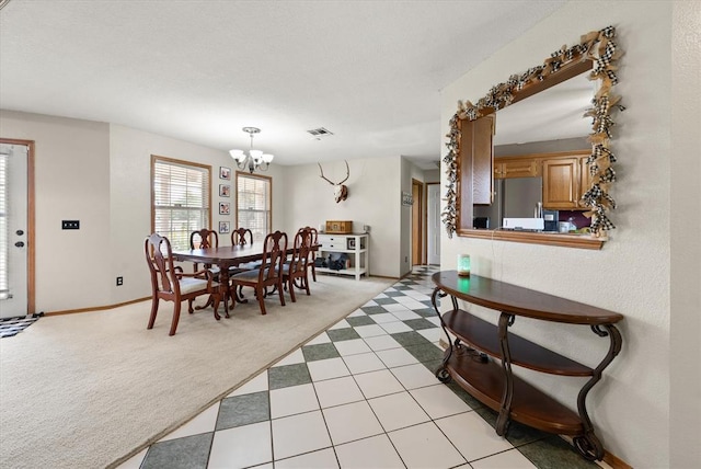 910796 S 3350th Rd, Wellston, OK 74881 - dining area with a chandelier and light colored carpet
