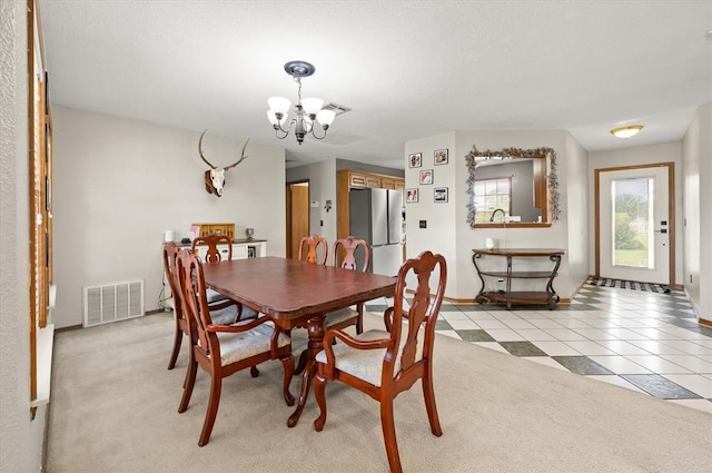 910796 S 3350th Rd, Wellston, OK 74881 - dining space featuring a chandelier and light colored carpet