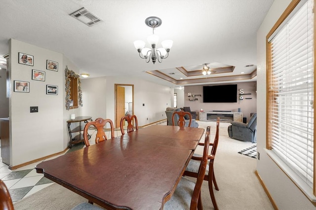 910796 S 3350th Rd, Wellston, OK 74881 - dining room with a ceiling fan, healthy amount of natural light, a chandelier, and a raised ceiling