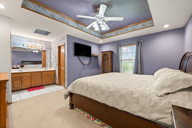910796 S 3350th Rd, Wellston, OK 74881 - bedroom with a raised ceiling, light carpet, ensuite bathroom, light tile patterned flooring, and ceiling fan