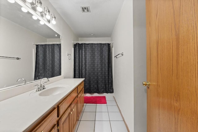 910796 S 3350th Rd, Wellston, OK 74881 - full bathroom with vanity, tile patterned flooring, and a shower with shower curtain