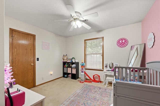 910796 S 3350th Rd, Wellston, OK 74881 - carpeted bedroom with baseboards and ceiling fan