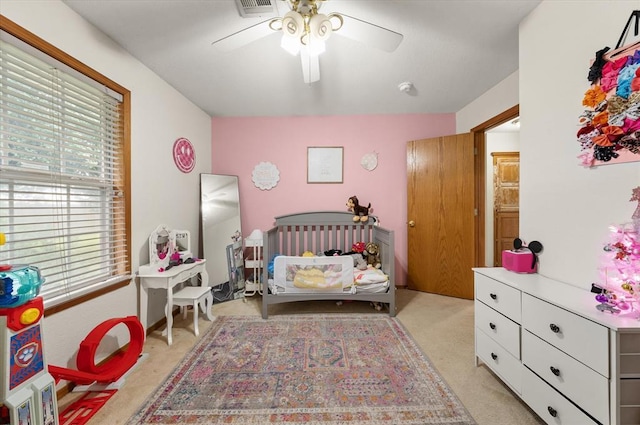 910796 S 3350th Rd, Wellston, OK 74881 - bedroom with multiple windows, light carpet, and a ceiling fan