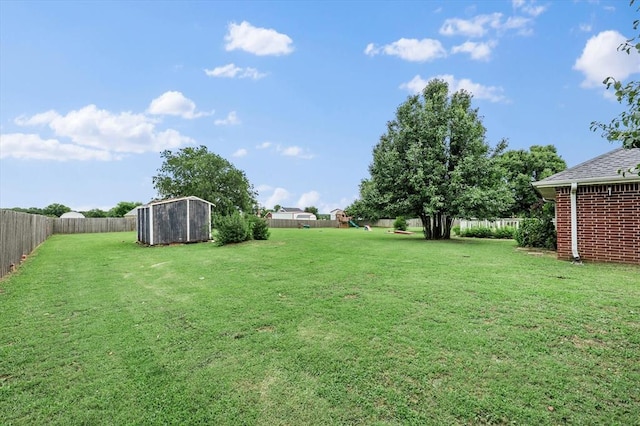 910796 S 3350th Rd, Wellston, OK 74881 - fenced backyard featuring a storage shed and a playground