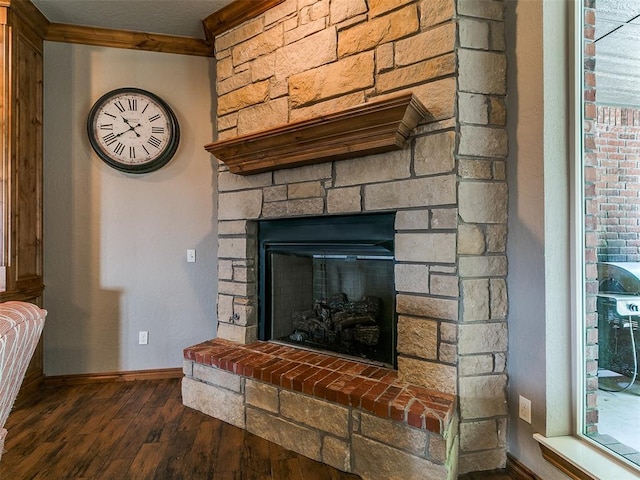 12905 S Mustang Rd, Mustang, OK 73064 - detailed view of wood finished floors and a stone fireplace