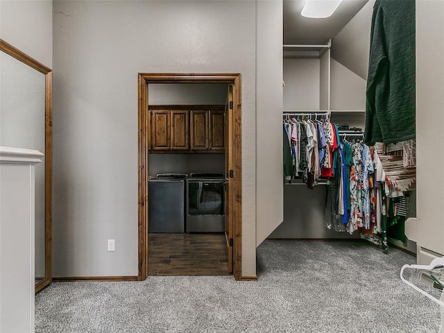 12905 S Mustang Rd, Mustang, OK 73064 - walk in closet featuring washing machine and dryer and carpet