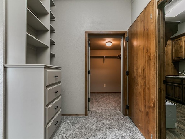 12905 S Mustang Rd, Mustang, OK 73064 - walk in closet with carpet flooring
