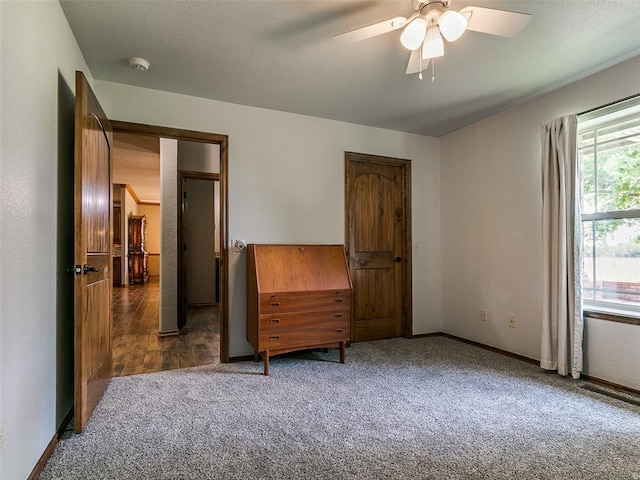 12905 S Mustang Rd, Mustang, OK 73064 - bedroom with carpet flooring and ceiling fan