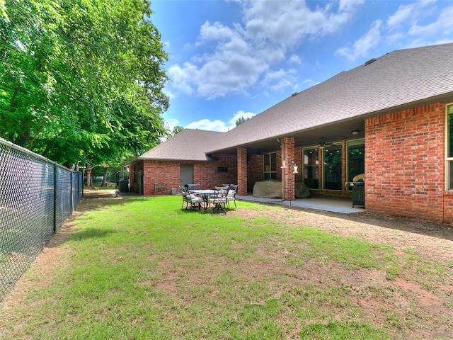 12905 S Mustang Rd, Mustang, OK 73064 - view of yard featuring ceiling fan and a patio