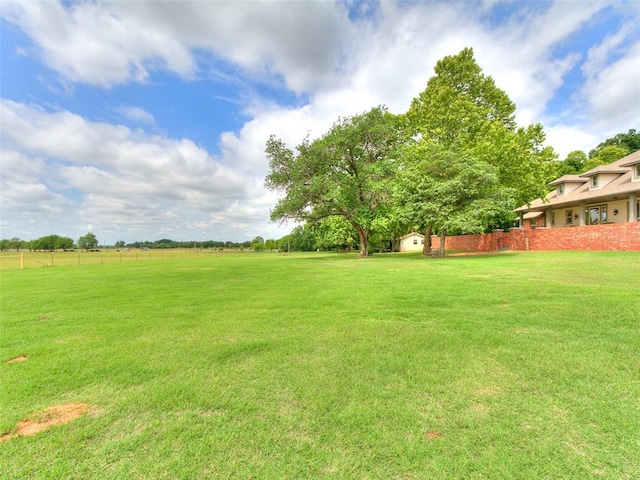 12905 S Mustang Rd, Mustang, OK 73064 - view of yard with a storage unit
