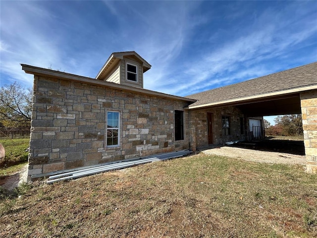 3850 E Camp Dr, Guthrie, OK 73044 - back of property with stone siding and a yard