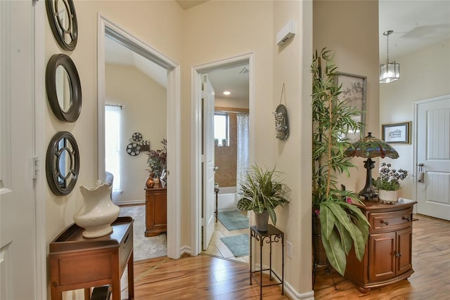 2221 NW 158th St, Edmond, OK 73013 - foyer featuring light wood-type flooring and baseboards