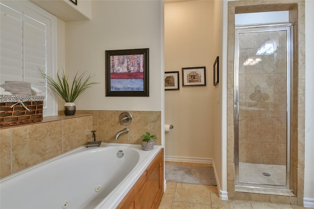 2221 NW 158th St, Edmond, OK 73013 - bathroom with a jetted tub, a shower stall, and tile patterned floors