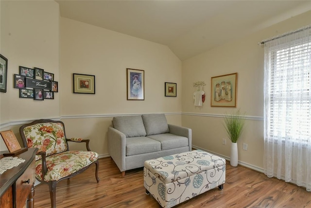2221 NW 158th St, Edmond, OK 73013 - living area featuring wood finished floors and lofted ceiling