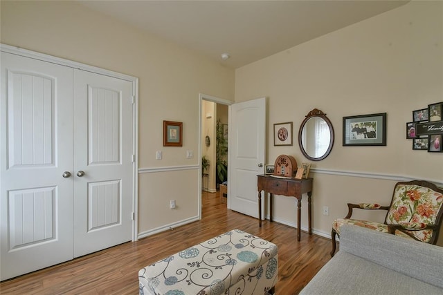 2221 NW 158th St, Edmond, OK 73013 - sitting room with wood finished floors and baseboards